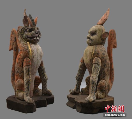 圖為慕容智墓出土鎮(zhèn)墓獸。 中新社發(fā) 甘肅省文物局 供圖